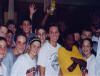 players celebrate when Coach Muller wins the half-court shot contest