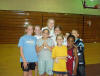 Coach Stachurski's team takes a moment from the action for a picture